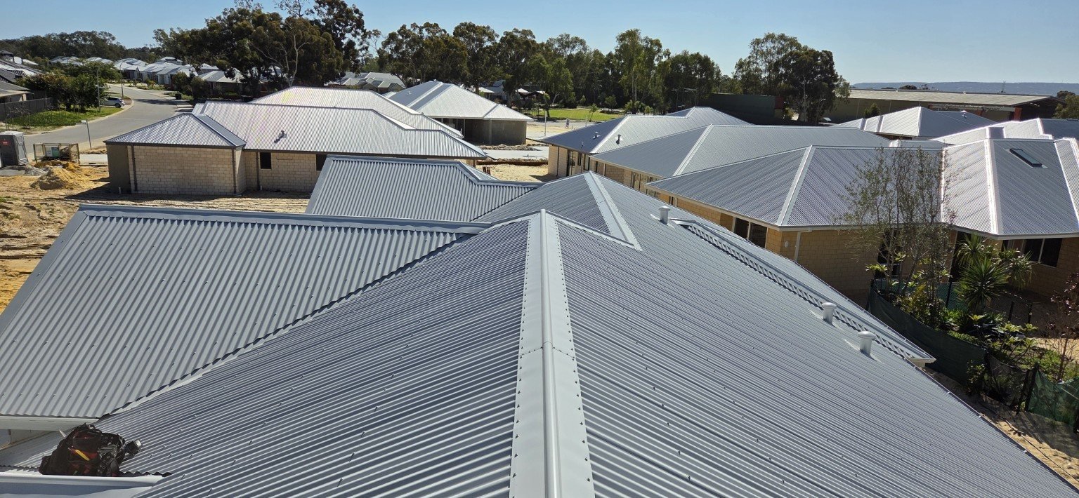 Residential metal roof ridge and flashing detail